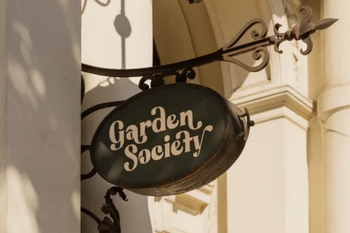 bring-vacation-garden-society-signage